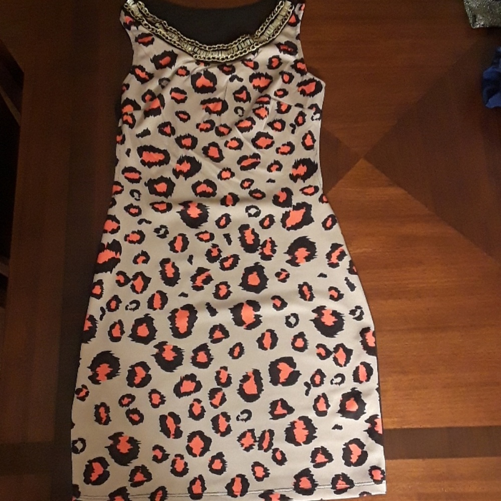 Short, open back dress.